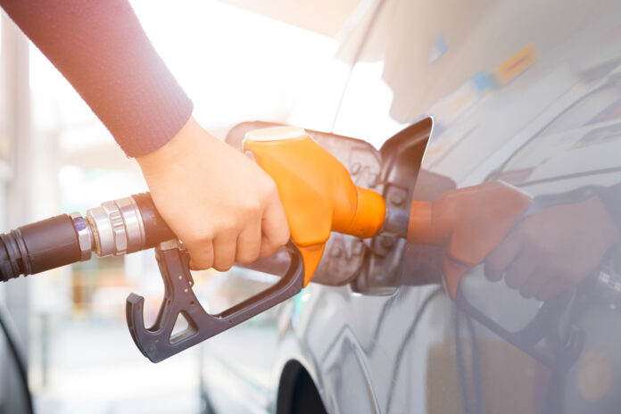 Grey,Car,At,Gas,Station,Being,Filled,With,Fuel,On Save on gas